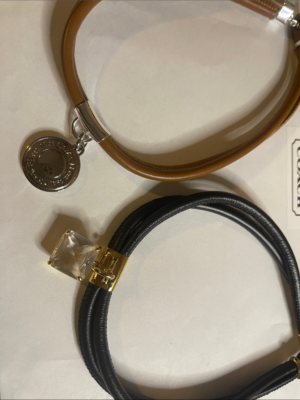 2 COACH Charm & Crystal Necklaces - Black & Brown